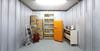 100 sq ft personal storage unit showcasing organised household items such as furniture, boxes, and appliances, providing a reliable space for temporary or long-term storage needs.