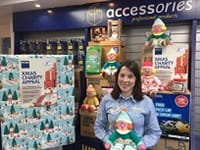 Woman holding Christmas gifts