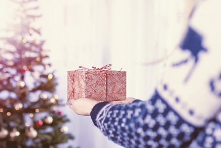 Carrying a Christmas gift
