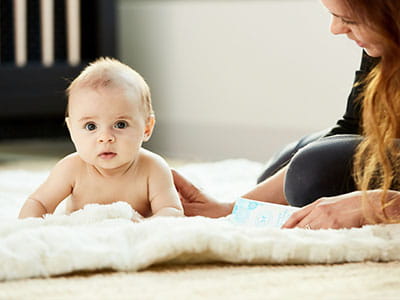 baby on a white mat