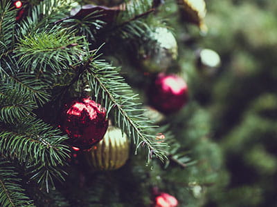 Christmas tree with red and yellow decoration globes