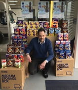 Man surrounded by Easter eggs