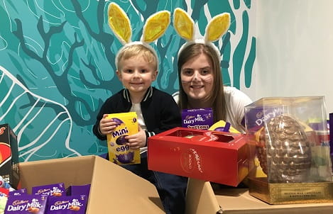 Girl & young boy with Easter eggs