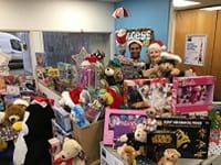 Piles of Christmas gifts in Access Self Storage reception