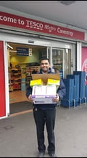 Access employee holding donated Easter eggs