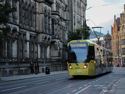 yellow and white tram