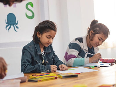 Two Girls Doing School Works