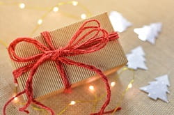 presents wrapped with red string