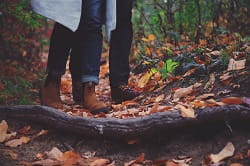 walking through autumn footpath