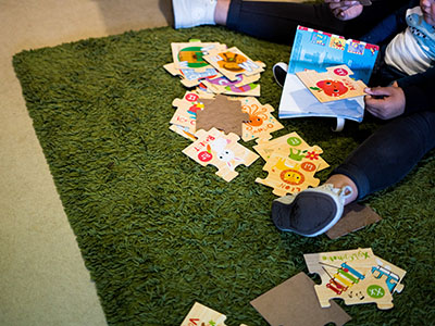 baby playing puzzle game