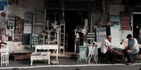 2nd hand furniture on display outside shop