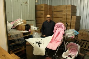 Local businessman is storage unit with his business goods.