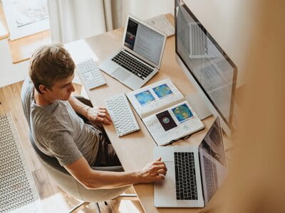 A man reading a working from home guide