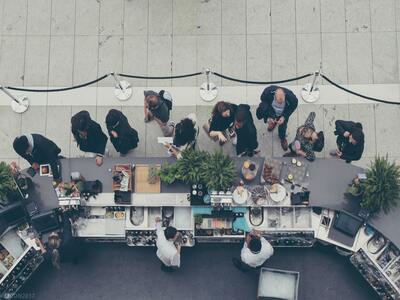 A group enjoying an outdoor drink at one of the many pub gardens in London