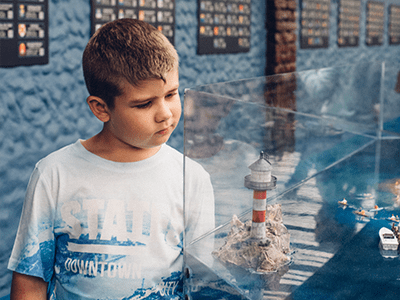 An image of a child in a museum for our guide to free museums in Manchester