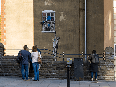 An image of an original example of Bristol Banksy for our blog on Bristol street art
